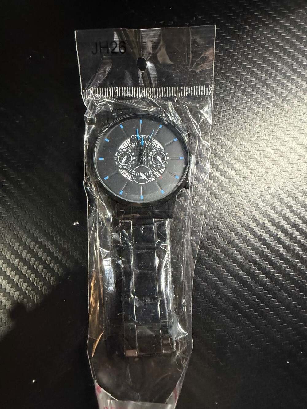 Geneva Men's Black Metal Link Fashion Watch with Blue Accents